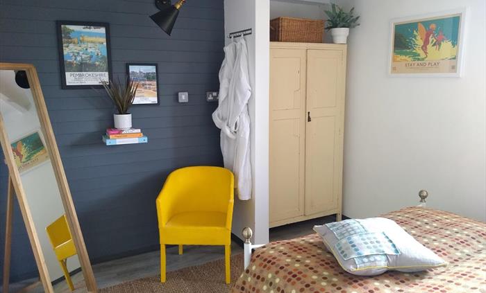 Milking Shed's bright and spacious bedroom.